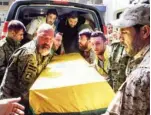  ??  ?? عناصر حزب الله ينقلون جثمان أحد قتلاهم بعرسال ( أ ف ب) تجارة المخدرات
