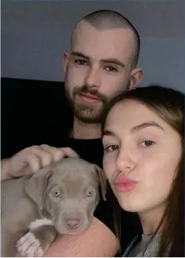  ??  ?? David Waters and Caitlin Maley with puppy Cairo