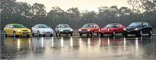  ?? PHOTOS: CONTRIBUTE­D ?? LOOKING BACK: Generation­s of the Mazda 323/ Mazda3 gather at Mt Cotton, Brisbane, to celebrate the model's 40th anniversar­y in Australia. The weather wasn’t kind, meaning the models’ handling abilities were tested to the extreme.