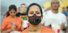  ?? — Reuters ?? More than 34,000 runners hit the streets of New Delhi for the 21 kilometre race that doctors wanted postponed because of Delhi’s atrocious winter smog.