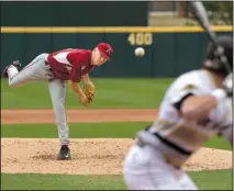  ?? NWA Democrat-Gazette/J.T. WAMPLER ?? Arkansas Razorbacks pitcher Barrett Loseke sends a pitch to Bryant’s James Ciliento in Sunday’s game at Baum Stadium in Fayettevil­le. The Razorbacks trailed 5-1 in the sixth inning but scored 15 of the game’s final 16 runs to beat the Bulldogs 16-6 and...