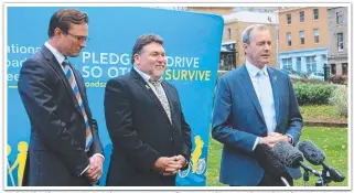  ?? Picture: David Killick ?? RACT chief executive Mark Mugnaioni, Safer Australian Roads and Highways president Peter Frazer and Infrastruc­ture and Transport Minister Michael Ferguson announce the speed limit changes.