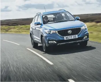  ??  ?? The all-new MG ZS electric SUV will look similar to the above 1.5 VTI petrol MG ZS.