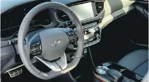  ??  ?? The Ioniq EV has a sport steering wheel and driver-centric cockpit, both of which make for an inviting cabin.