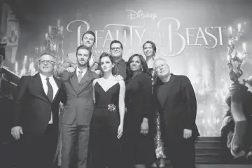  ??  ?? Director Condon and composer Alan Menken pose with cast members Dan Stevens, Luke Evans, Emma Watson, Josh Gad, Audra McDonald and Gugu Mbatha-Raw at the premiere of ‘Beauty and the Beast’ in Los Angeles, California, US recently. — Reuters photo