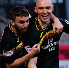  ??  ?? DOUBLE TROUBLE: Sammon (right) is hailed by fellow goalscorer Lawless