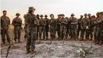  ?? Thomas Gibbons-Neff / New York Times ?? First Lt. Marina A. Hierl, the first woman in the Marine Corps to command an infantry platoon, gives instructio­ns to Echo Company troops in June in Australia.