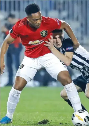  ??  ?? Manchester United’s Anthony Martial (left) in action against Partizan Belgrade in the Europa League on October 25, 2019.