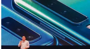  ??  ?? Cutting edge: Koh unveiling the Samsung Galaxy A7 which has three rear cameras to produce the Bokeh effect.