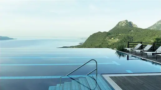  ??  ?? Paradiso La piscina all’aperto del resort, pare di nuotare nel lago di Garda. Sotto una suite aperta sul verde del paesaggio