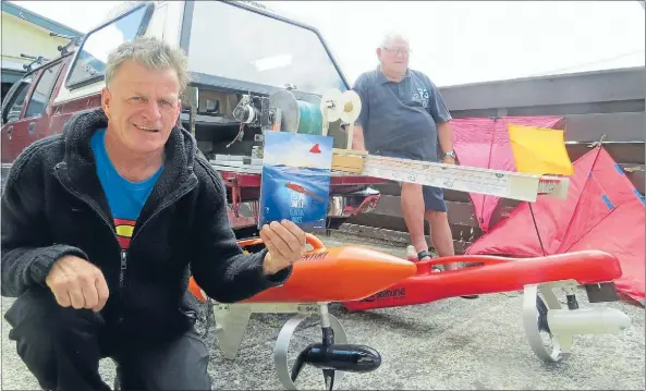  ??  ?? UNIQUE METHOD: Steve O'Brien, left, is now the published author of the only book in New Zealand about kontiki fishing which features Tokoroa's Brian Williamson.