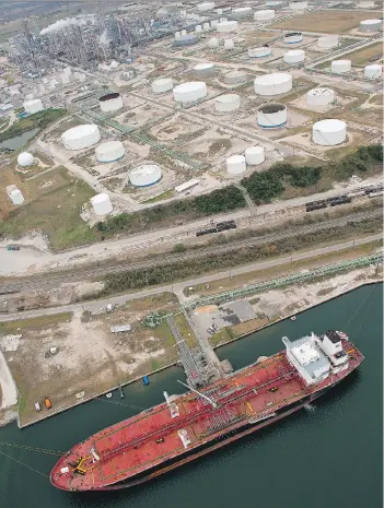  ?? EDDIE SEAL/BLOOMBERG FILES ?? A Chevron Corp. tanker loads oil in Corpus Christi, Texas. Access to the Gulf would bring relief to long-suffering Canadian oil and gas producers, Claudia Cattaneo writes.