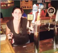  ?? Contribute­d photo ?? Kristine Casey on her opening day at Casey’s Irish Pub in Milford.