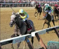  ?? PHOTO SPENCER TULIS/FOR THE SARATOGIAN ?? Catherinet­hegreat takes to the inside rail to capture the Grade 3 $150,000 Schuylervi­lle for 2-year-old fillies on opening day at historic Saratoga Race Course.