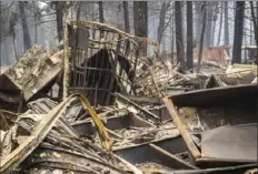  ?? Stuart W. Palley/The Washington Post ?? The U.S. Post Office in Grizzly Flats, Calif., was destroyed by the Caldor Fire on Wednesday.