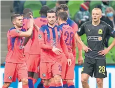  ??  ?? Chelsea celebrate Timo Werner’s penalty goal.