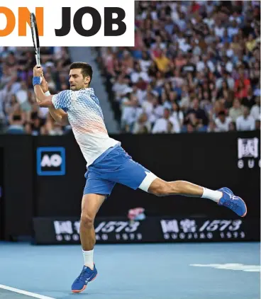  ?? (AFP) ?? Serbia's Novak Djokovic hits a return against Australia's Alex De Minaur during their Australian Open round-of-16 match on Monday