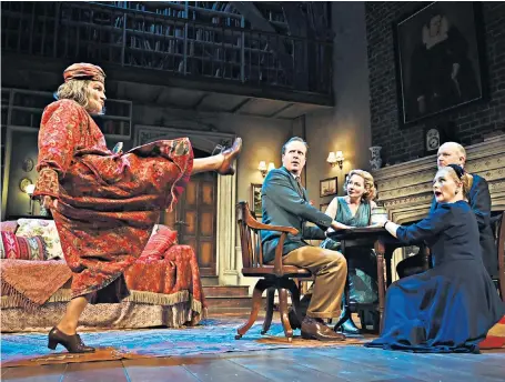  ??  ?? Jennifer Saunders as Madame Arcati, left, Geoffrey Streatfeil­d as Charles, Lisa Dillon as Ruth, Lucy Robinson as Mrs Bradman and Simon Coates as Dr Bradman in Noël Coward’s Blithe Spirit, at the Duke Of York’s Theatre in London.