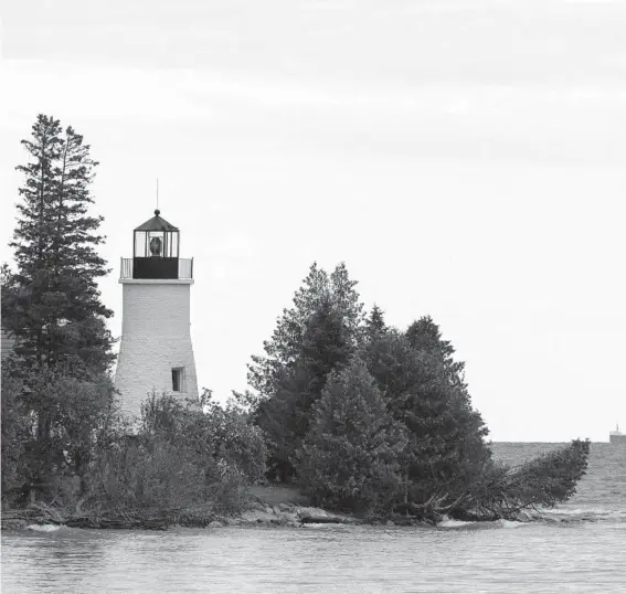  ?? KEVIN MIYAZAKI/THE NEW YORK TIMES PHOTOS ?? A lighthouse in the Thunder Bay National Marine Sanctuary.