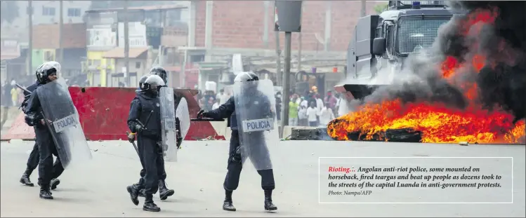  ?? Photo: Nampa/AFP ?? Rioting… Angolan anti-riot police, some mounted on horseback, fired teargas and beat up people as dozens took to the streets of the capital Luanda in anti-government protests.