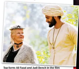  ??  ?? Top form: Ali Fazal and Judi Dench in the film