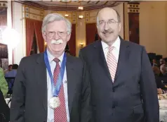  ??  ?? JOHN BOLTON (left) and Dore Gold.