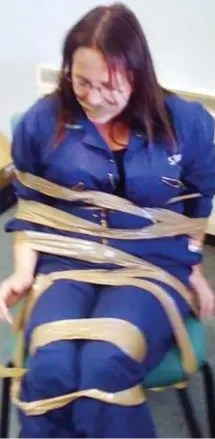  ??  ?? Ordeal: Miss Fitzpatric­k taped to a chair and gagged