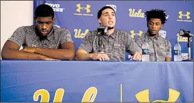  ?? AP/JAE C. HONG ?? Flanked by teammates Cody Riley and Jalen Hill, UCLA’s LiAngelo Ball reads a prepared statement Wednesday during a news conference in Los Angeles in which the players apologized for last week’s shopliftin­g incident in Hangzhou, China.