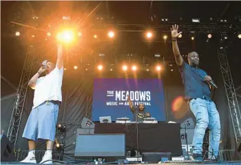  ?? ANGELA WEISS/GETTY-AFP ?? David “Trugoy the Dove”Jolicoeur, from left, Vincent “Maseo” Mason and Kelvin “Posdnuos” Mercer of De La Soul perform in 2017. The group’s first album in 1989 showcased a more playful and melodic idea of hip-hop.