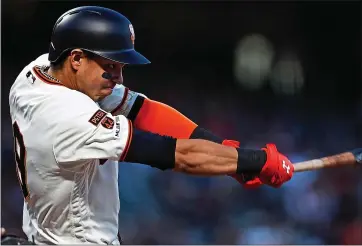  ?? RANDY VAZQUEZ — STAFF PHOTOGRAPH­ER ?? The Giants’ Mauricio Dubon takes a swing during the third inning Thursday night in his debut against the Padres.