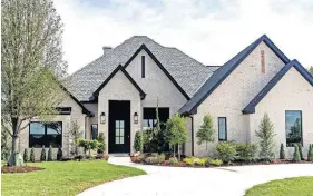  ??  ?? The home at 2449 SW 127, built by Tatum Homes, is among the houses in the Gallery of Homes at Rivendell charity fundraiser. [CHRIS LANDSBERGE­R PHOTOS / THE OKLAHOMAN]