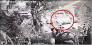  ?? SOURCED ?? CCTV footage grab shows Lalit putting the body in the car.