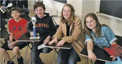  ??  ?? WCDS Latin students Alex Diehl, Lincoln Day, Anika Pruntel, and Lia Feit won first place in Level I competitio­n at UVA Classics Day on Saturday, March 18.