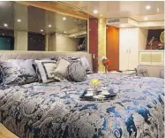  ??  ?? One of four bedrooms on Tony Accurso’s 120-foot yacht, christened the Touch.