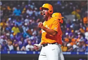  ?? TENNESSEE ATHLETICS PHOTO ?? Tennessee’s Luc Lipcius celebrates one of his two runs scored during a 5-2 Southeaste­rn Conference tournament win over LSU that began Friday night at 11:10 Eastern and ended Saturday morning at 2:12.