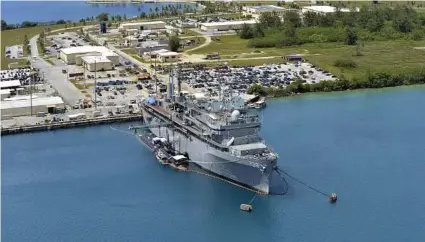  ?? Jamica Johnson / AFP photo / U.S. Navy ?? Guam residents are as aware of U.S. military presence as they are of the deep blue Pacific Ocean and coral reefs; they hope that military will protect them in the event of war.