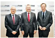  ??  ?? Secret servants: Bernard Emie of France’s DGSE, Bruno Kahl, of Germany’s BND, and Alex Younger, head of MI6. Left, Mrs May and Mrs Merkel meet in Berlin