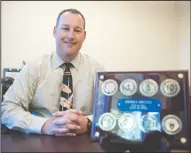  ?? BEA AHBECK/NEWS-SENTINEL ?? Left: Newly promoted Lodi Police Capt. Sierra Brucia in his office at the police department on Wednesday.