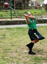  ??  ?? The Sentinel-Record/Tanner Newton ABOVE: Stacy Green, two-time world champion and athletic director of the Hot Springs Renaissanc­e Faire, shows how to throw a 42-pound weight for distance at Hollywood Park on Tuesday. RIGHT: Stacy Green displays a 42-pound weight for distance and a 22-pound Scottish Hammer at Hollywood Park .