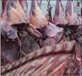  ?? PHOTO: BLOOMBERG ?? Meat hangs on display for sale at a butchery stall inside a market in Sao Paulo, Brazil. SA has now joined other countries in suspending Brazilian meat imports.