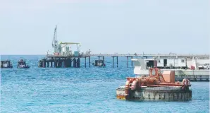  ??  ?? PIPELINES ARE seen at the Zueitina oil terminal near Benghazi in 2014.