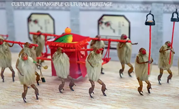  ??  ?? Hairy monkeys depict Chinese traditiona­l marriage customs.
