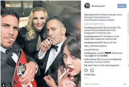  ??  ?? Courtney Love (rear), daughter Frances Bean Cobain, Marc Jacobs (right) and his boyfriend, Char Defrancesc­o, have a smoke break during May’s Met Gala.