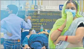  ?? DEEPAK GUPTA/HT PHOTO ?? A Covid patient on oxygen support at Dr Ram Manohar Lohia Institute of Medical Sciences in Lucknow on Tuesday.