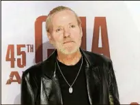  ?? EVAN AGOSTINI /
AP FILE PHOTO ?? Singer Gregg Allman arrives at the 45th annual CMA Awards in Nashville in November 2011. Allman’s last album, “Southern Blood,” will be released in September.