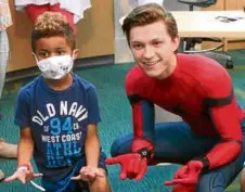  ??  ?? “SpiderMan” actor Tom Holland visits sick children during his spare time.
