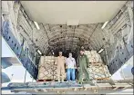  ?? KUNA photos ?? Left-right: Kuwait’s plane with 45 tons of relief aid lands at Khartoum airport.