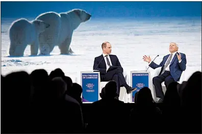  ?? AP/MARKUS SCHREIBER ?? Britain’s Prince William (left) listens to Sir David Attenborou­gh, broadcaste­r and natural historian, during a session Tuesday at the World Economic Forum in Davos, Switzerlan­d.