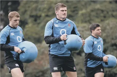  ??  ?? England’s Owen Farrell (centre) during the training session at Pennyhill Park, Bagshot, yesterday.