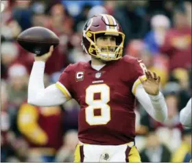  ?? MARK TENALLY — THE ASSOCIATED PRESS ?? In a file photo, Washington Redskins quarterbac­k Kirk Cousins (8) throws the ball during a game against the Arizona Cardinals last season. Cousins will visit with the Minnesota Vikings on Wednesday after the league year begins, his agent Mike McCartney...